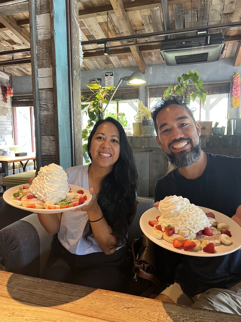 Couple with giant pancakes